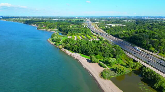 Aerial of Charles Daley Park beach on lake Ontario along Queen Elizabeth Way