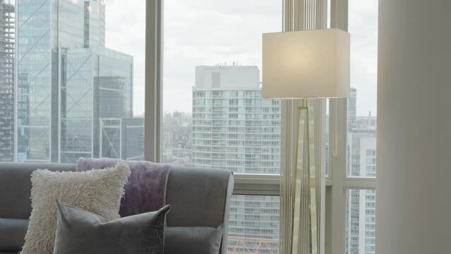 Reveal the view from living area of a high-rise condominium unit