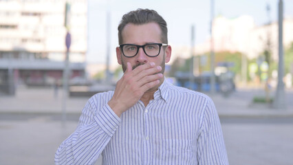 Portrait of Shocked Young Adult Man Wondering in Awe Outdoor