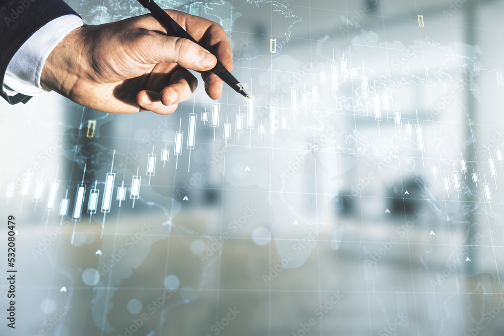 Poster multi exposure of trader hand with pen working with virtual abstract financial chart and world map o