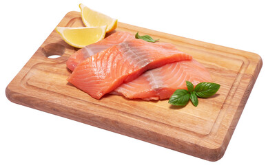 piece of salmon fillet on wooden cutting board