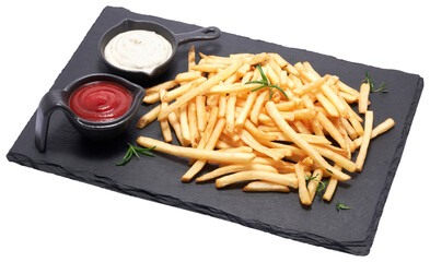 French fries potatoes on black stone serving board isolated