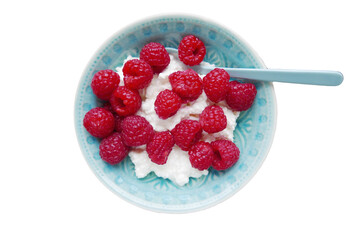 Fresh pink raspberries with cottage cheese on small blue bowl  isolated on transparency photo png file 