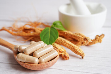 Ginseng roots and green leaf, healthy food.