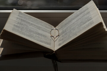 old book with cross