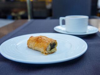 Handmade Spinach Cheese Pie - pastry, Turkish name el acmasi borek, rulo borek. Turkish borek rolls with spinach and cheese. A traditional Turkish pastry rulo borek