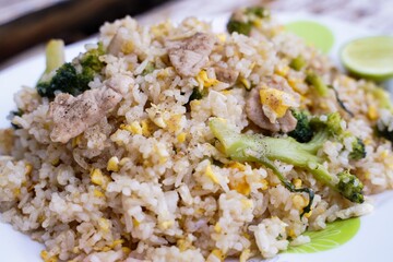 Fried rice is an easy and delicious dish.  consisting of eggs  Pork and broccoli and still affordable during bad economic times.