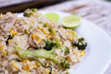 Fried rice is an easy and delicious dish.  consisting of eggs  Pork and broccoli and still affordable during bad economic times.