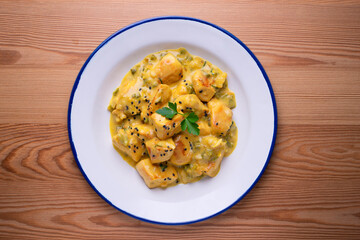 Chicken curry cooked with cream. Typical Indian recipe.