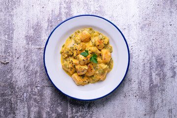 Chicken curry cooked with cream. Typical Indian recipe.