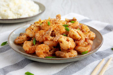 Homemade Crispy Salt and Pepper Shrimp with Scallions on a Plate, side view.