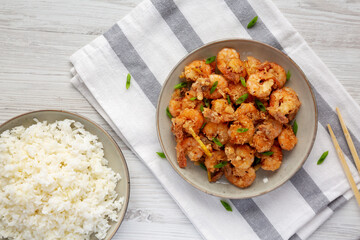 Homemade Crispy Salt and Pepper Shrimp with Scallions on a Plate, top view. Flat lay, overhead, from above.