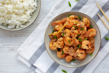 Homemade Crispy Salt and Pepper Shrimp with Scallions on a Plate, top view. Flat lay, overhead, from above.
