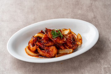 shrimp with butter sauce (Indonesia : udang saus mentega). Plating on white plate