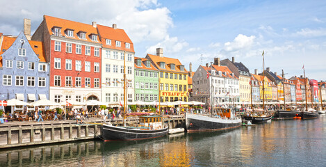 Fototapeta na wymiar Copenhagen, Denmark on august 21, 2022: Nyhavn district is one of the most famous landmark in Copenhagen