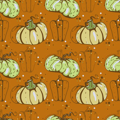 Autumn seamless vector pattern with pumpkins and fall leaves. Hand drawn illustration.
