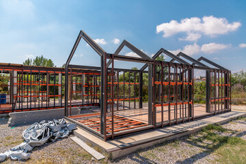 Metal frame of newly built building. Construction of a new tiny house