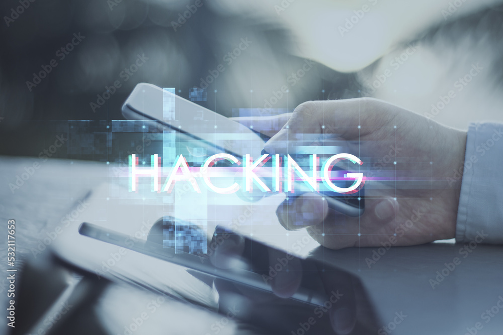 Poster businessman hand using smartphone at desktop with creative glowing big data glitch on blurry backgro