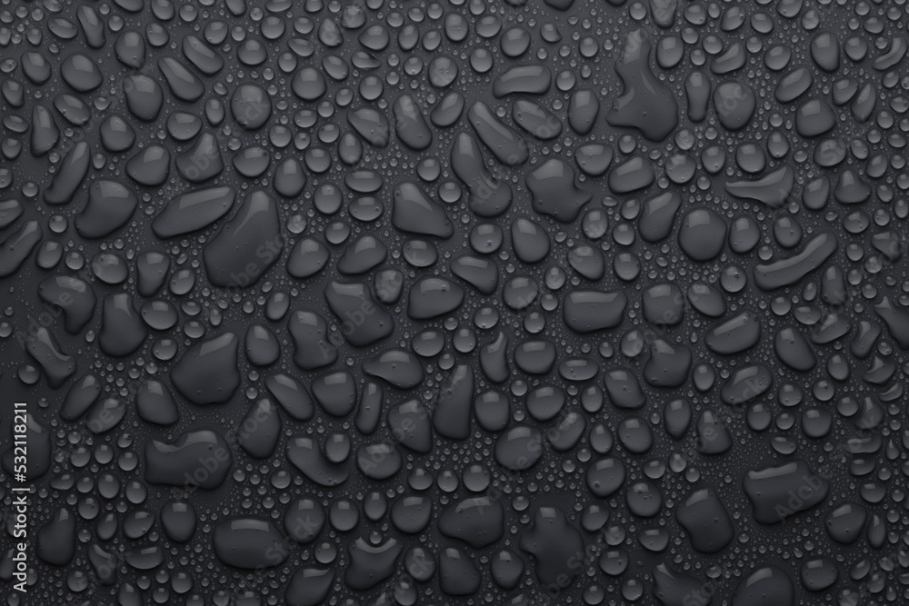 Poster water drops on dark grey background as elegant pattern with formless and round drops, top view.