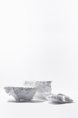 White podiums mockup of styrofoam as abstract snowy cliffs for presentation cosmetics products or...