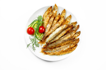Pan fried crispy smelt, close-up. Close-up, selective focus. White background.