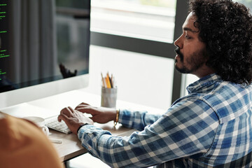 Indian Programmer Programming on Computer