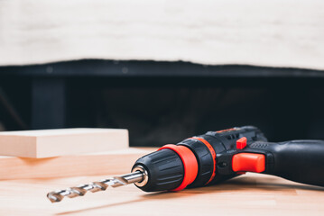 Screwdriver. Screwdriver on a wooden background. In a workshop.