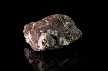 A piece of the mineral chalcopyrite with a rough surface and white and yellow inclusions