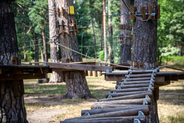 High ropes experience adventure tree park. Rope road course in t