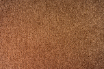 Fototapeta na wymiar Texture background of velours brown fabric. Fabric texture of upholstery furniture textile material, design interior, wall decor. Fabric texture close up, backdrop, wallpaper.