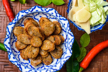 Notrhern thai spicy sausage on the porcelain product.