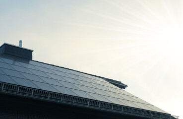 Solar panels on a roof, alternative energy, zero emission, sun power, energy transition