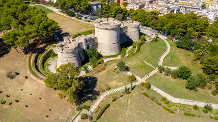 Fototapeta na wymiar Aerial view of Castello Tramontano, a 16th century fortification in Aragonese style in Matera, Basilicata, Italy. The castle is situated on a hill above the historical centre of the city.