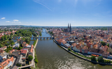 Fototapeta na wymiar Drohne Panorama der Stadt Regensburg in Bayern mit dem Fluss Donau dem Dom und der steinernen Brücke im Sommer, Deutschland