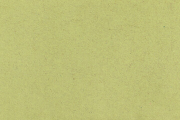 Green paper background. Full frame texture.