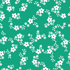 Simple vintage pattern. white flowers. green background. Fashionable print for textiles and wallpaper.