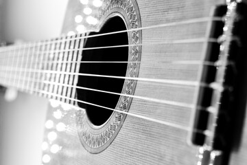 Obraz premium closeup classical guitar isolated on a black and white background