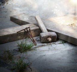 Wooden cross and iron nails