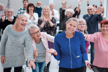 Businesswoman addressing colleagues at office meeting