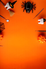 Happy halloween.dental concept.spider web pumpkin.dental tools on orange