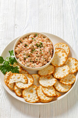 classic ham salad with crackers on white plate