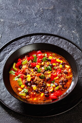 Obraz na płótnie Canvas taco soup of ground beef, corn, beans and veggies