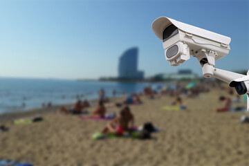 Video surveillance system on the beach. Blurred background with people on the beach