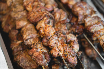 delicious and fragrant meat, skewers on grill