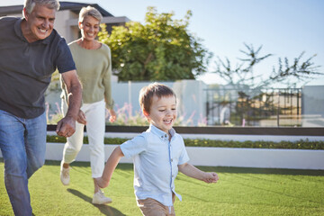 Family, grandparents and running with child in garden for happy, health and love together. Care,...