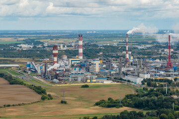 aerial view on pipes of chemical enterprise plant. Air pollution concept. Industrial landscape environmental pollution waste of thermal power plant