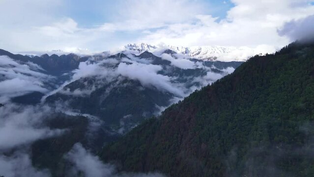 Drone Shot of a cloudy Sainj Valley in Himachal Pradesh near Manali, Kasol