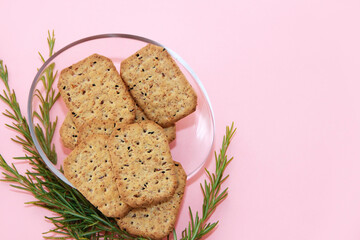 dry square crackers with black cumin seeds and quinoa for dietary nutrition
