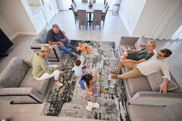 Big family in living room home with parents, baby or children play on carpet for growth,...