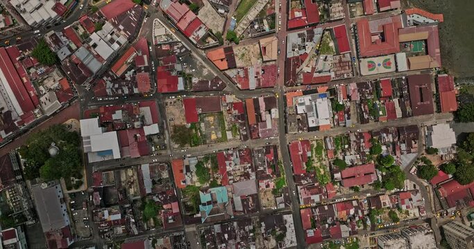 Panama City Aerial v110 vertical flyover casco antiguo historic district capturing vibrant colonial houses built with red tiled roofs and narrow streets - Shot with Mavic 3 Cine - April 2022
